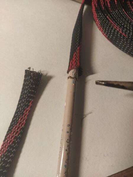 File:Drone cuttingthetube.jpg